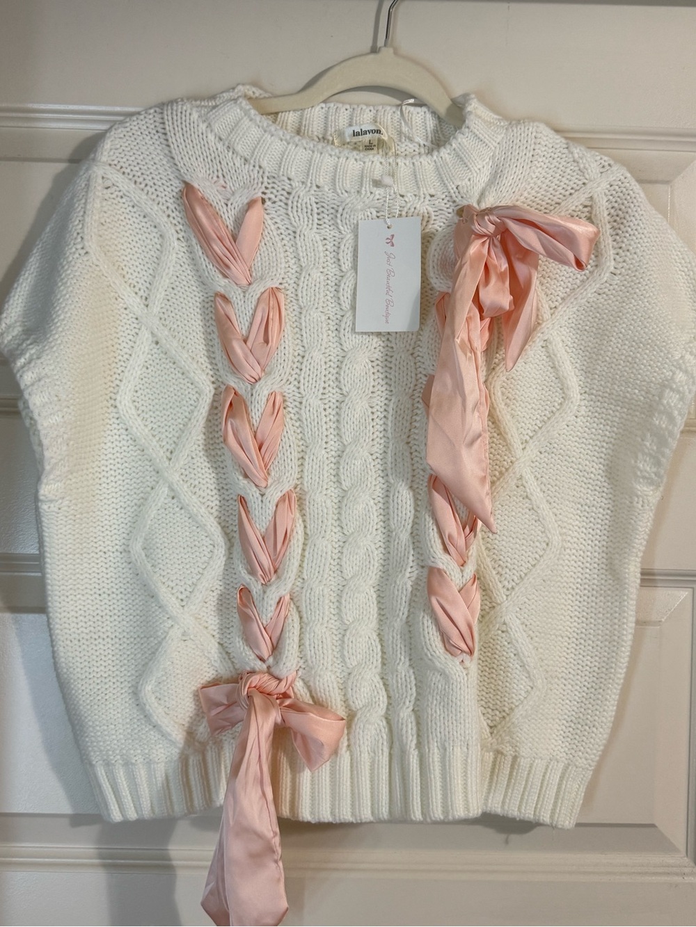 Ivory Cable Knit Sweater with Pink Ribbon Accents